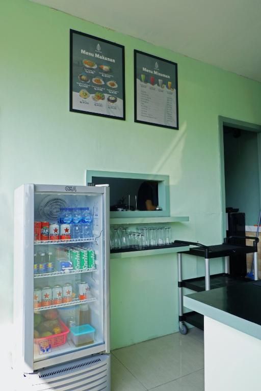 Kuchyň nebo kuchyňský kout v ubytování LEAF HoteL