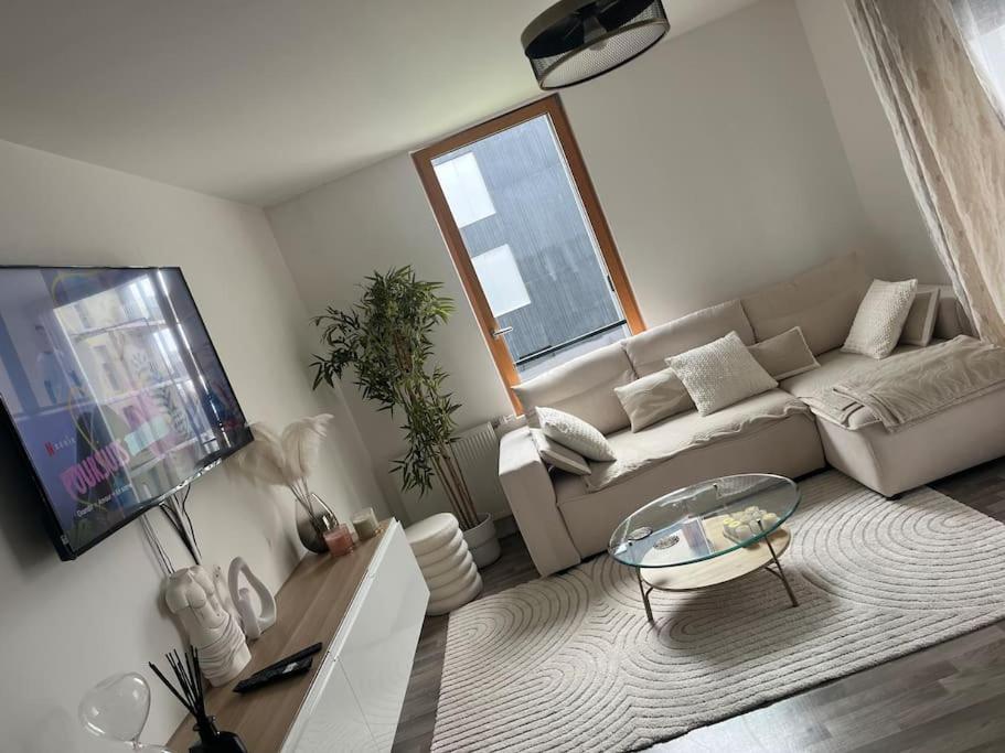 Χώρος καθιστικού στο Appartement proche Stade de France Saint Denis