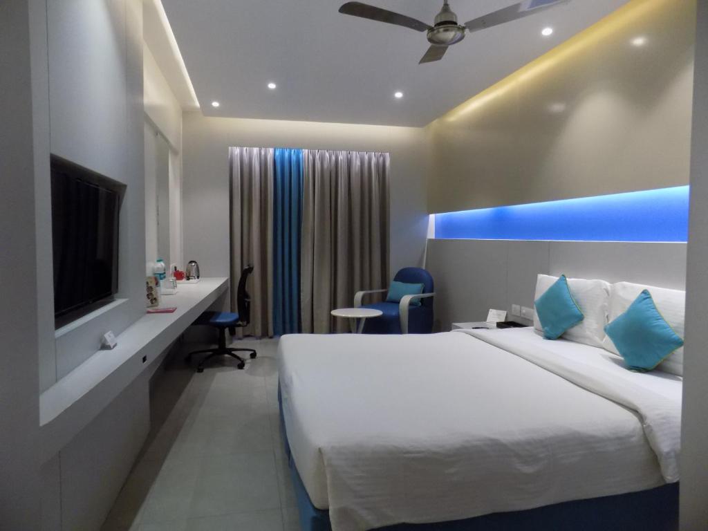 Postel nebo postele na pokoji v ubytování ZIBE Coimbatore by GRT Hotels