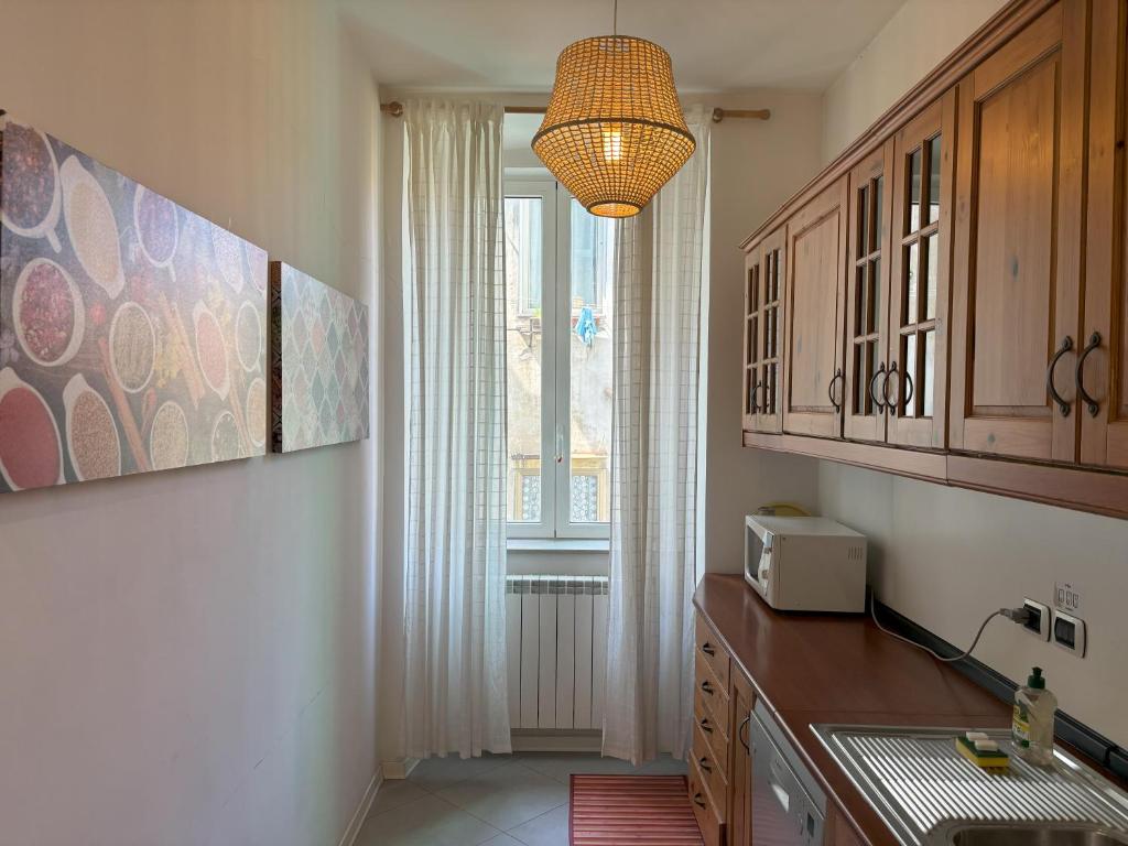 Kuchyňa alebo kuchynka v ubytovaní Flat Belpoggio 13