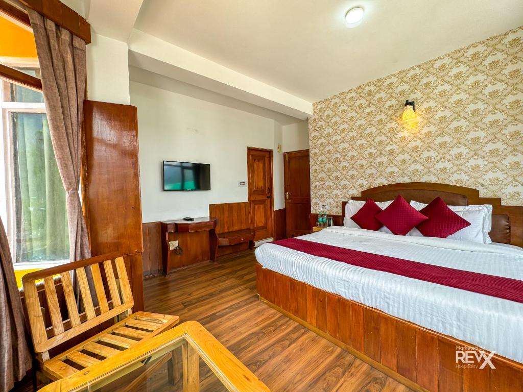 Postel nebo postele na pokoji v ubytování Shanag Inn Resort
