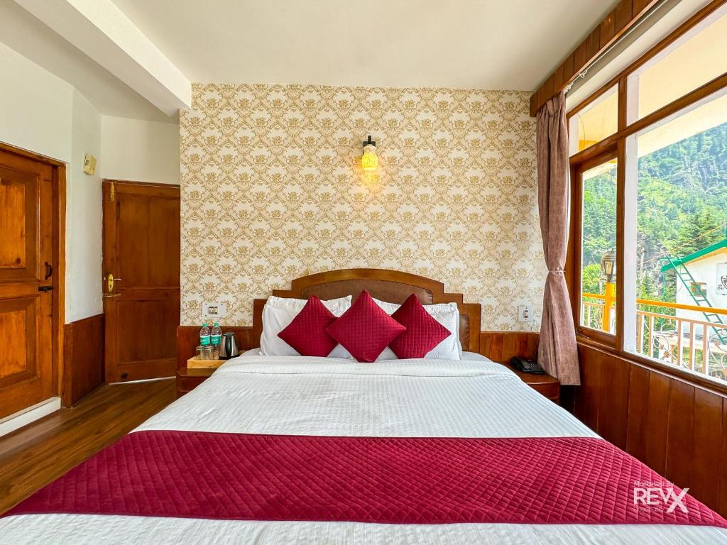 Postel nebo postele na pokoji v ubytování Shanag Inn Resort