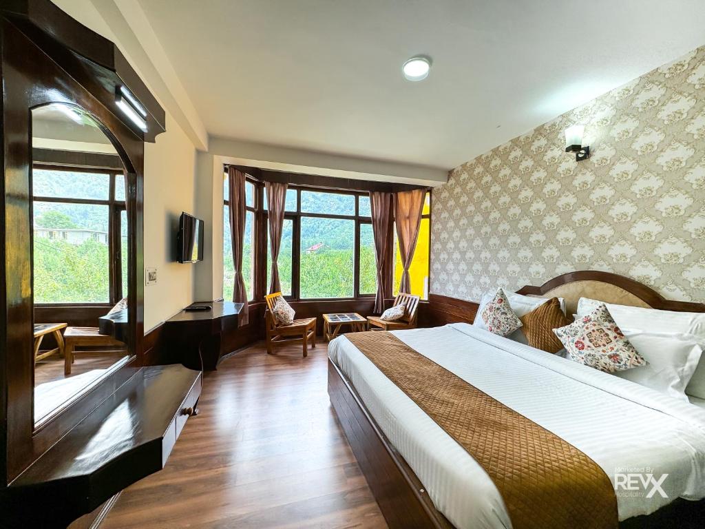 Postel nebo postele na pokoji v ubytování Shanag Inn Resort