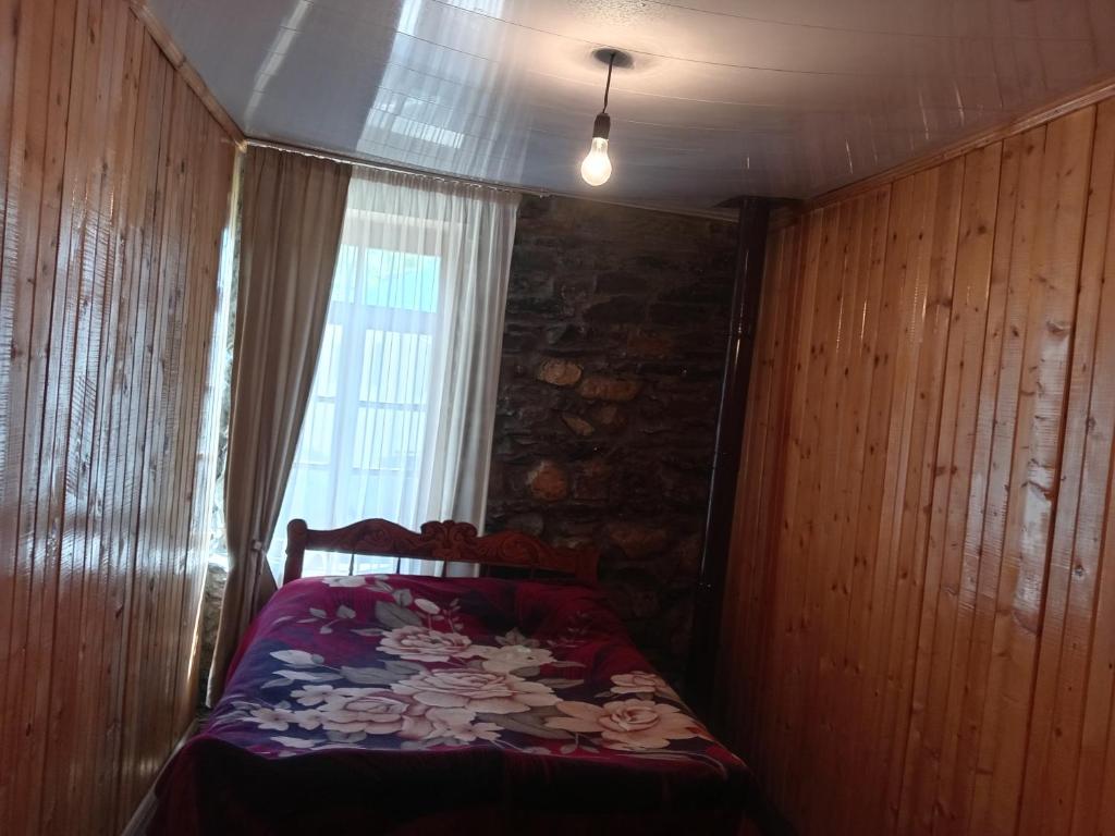 Postel nebo postele na pokoji v ubytování Stone House marexi