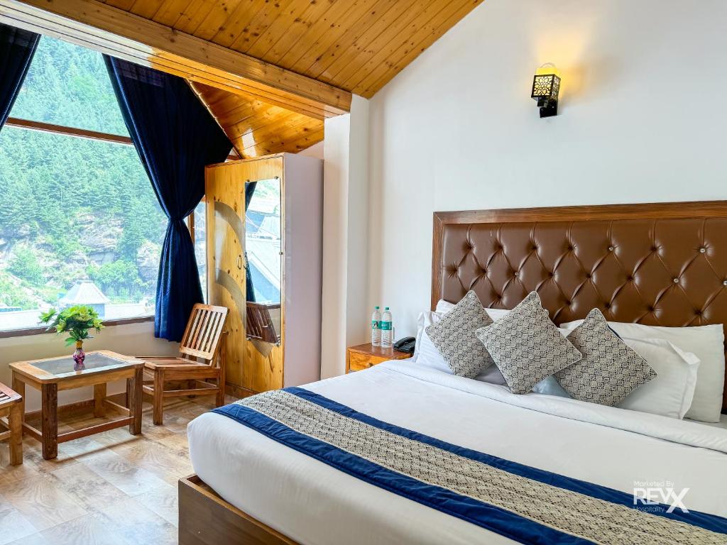 Postel nebo postele na pokoji v ubytování Shanag Inn Resort