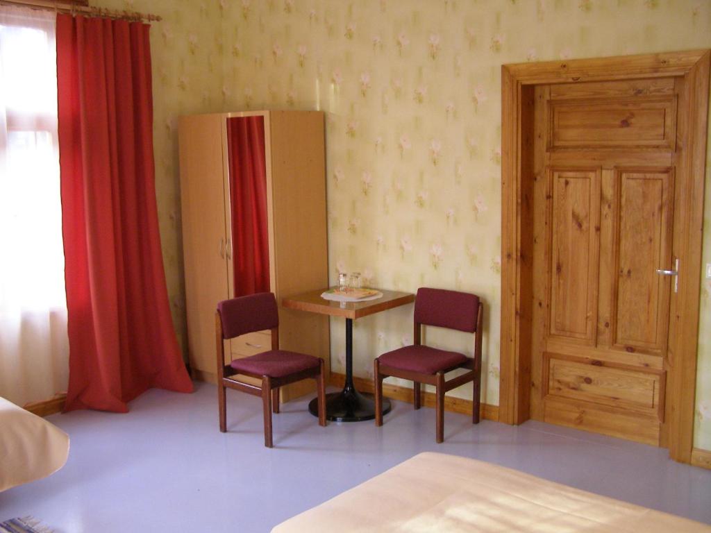Postel nebo postele na pokoji v ubytování Tiia Guesthouse