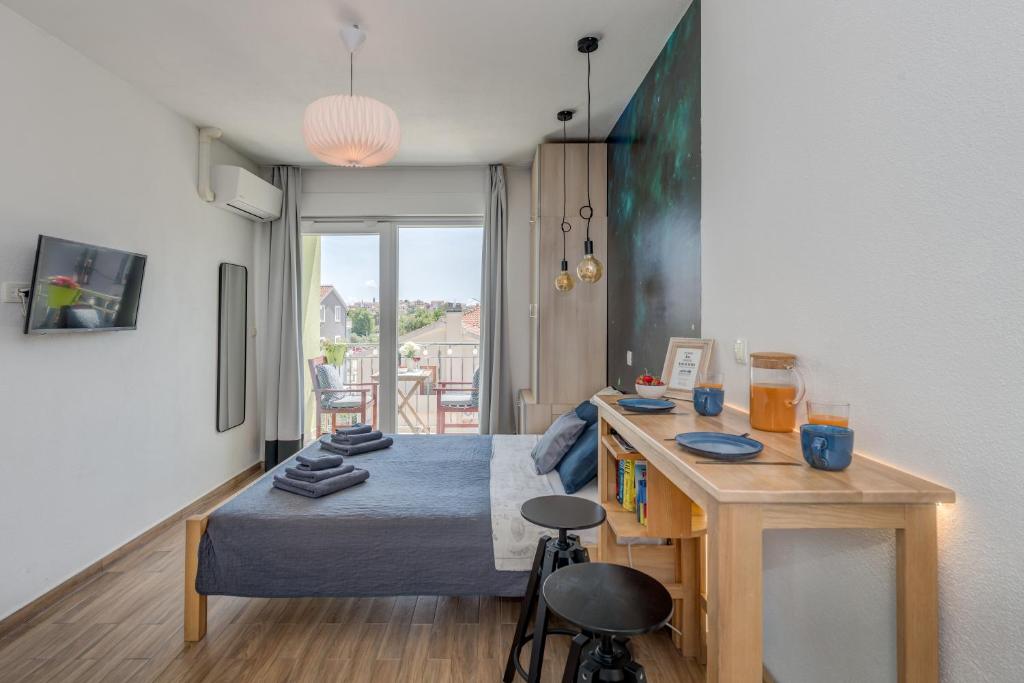 Televízia a/alebo spoločenská miestnosť v ubytovaní Trogir Downtown Apartments