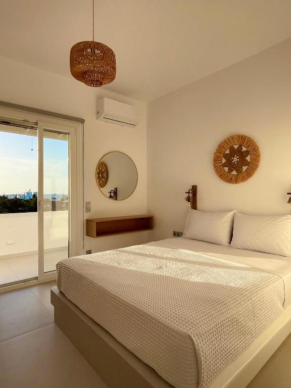 Postel nebo postele na pokoji v ubytování Yara Residence