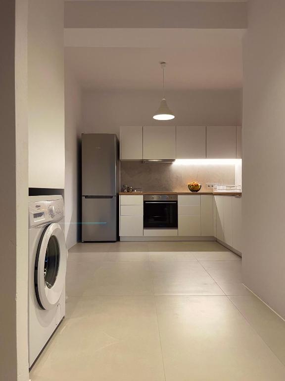 Kuchyň nebo kuchyňský kout v ubytování Yara Residence