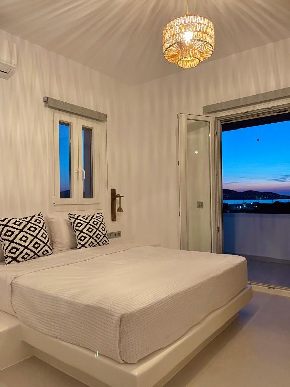 Postel nebo postele na pokoji v ubytování Yara Residence