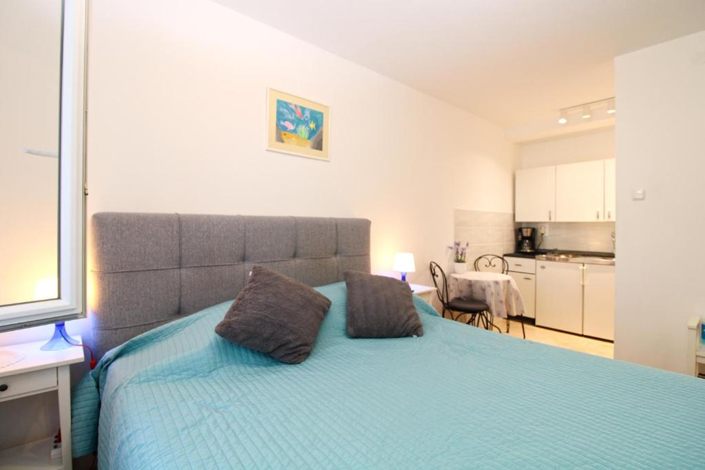 Kuchyň nebo kuchyňský kout v ubytování Apartment Marija 1387