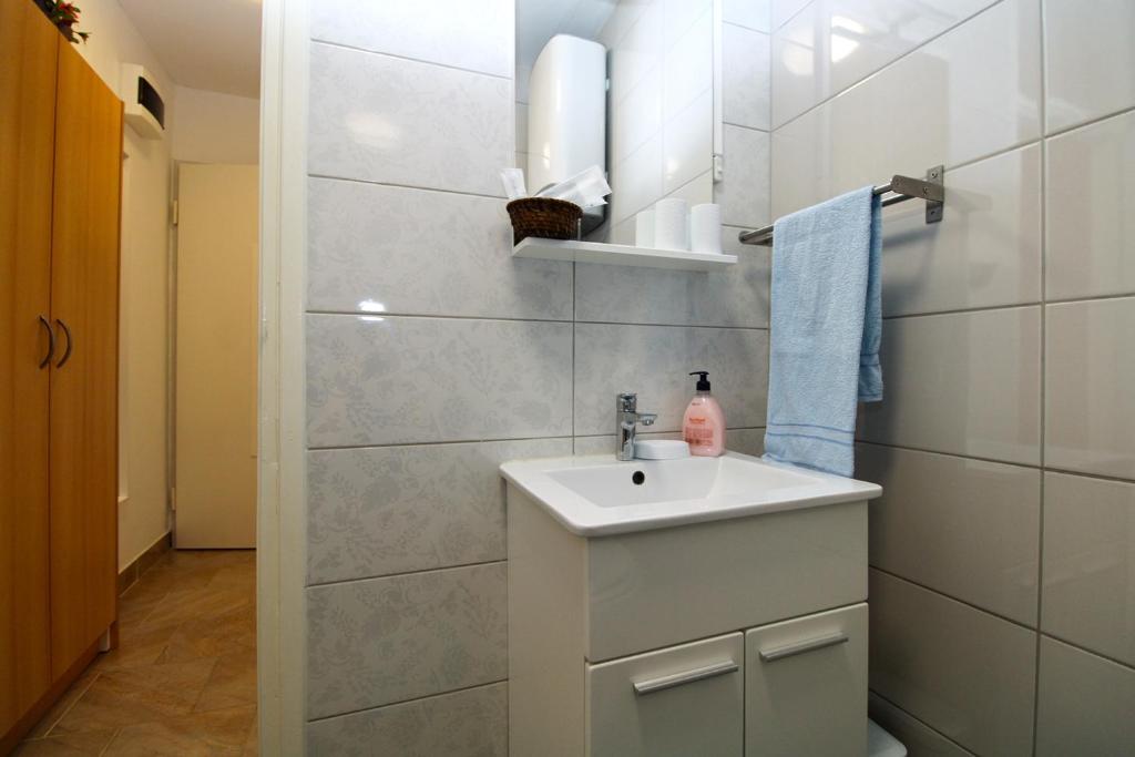 Koupelna v ubytování Apartment Marija 1387