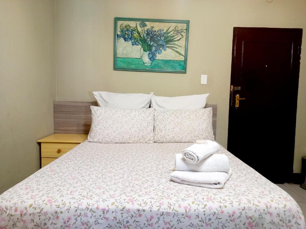 Giường trong phòng chung tại G&G Guesthouse