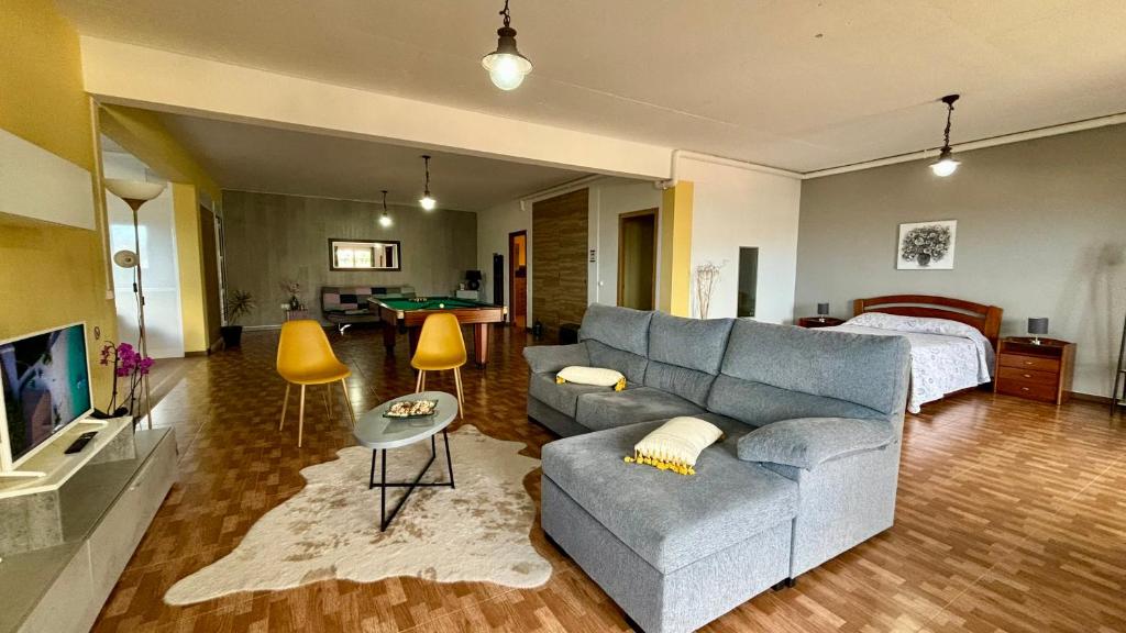 Uma televisão e/ou sistema de entretenimento em Ocean Hill House