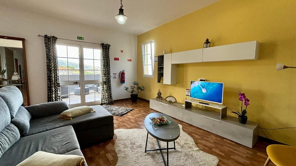 Uma televisão e/ou sistema de entretenimento em Ocean Hill House