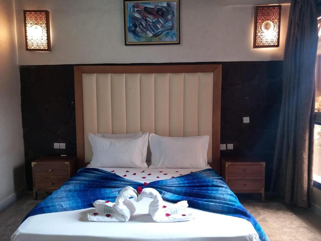 Postel nebo postele na pokoji v ubytování Auberge kasbah tifirte