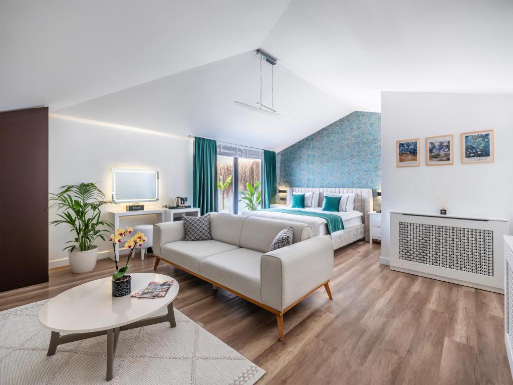 Postel nebo postele na pokoji v ubytování Hillora Hotel Buyukada
