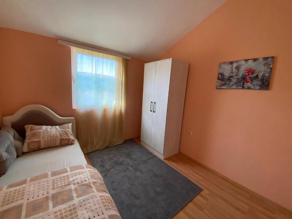 Postel nebo postele na pokoji v ubytování Sneky