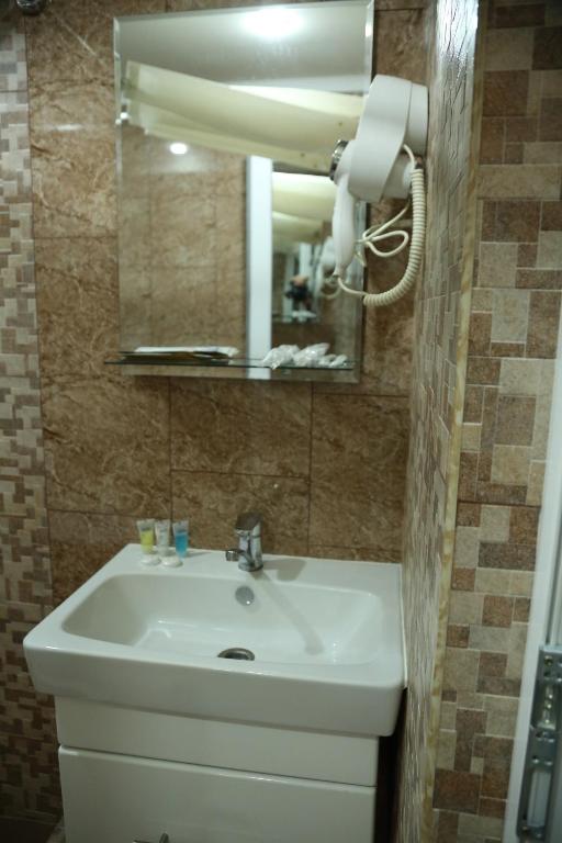 Koupelna v ubytování Vell Grey Hotel