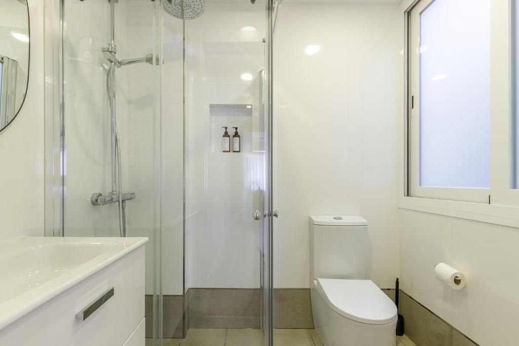 Kúpeľňa v ubytovaní Six Apartments by Caleta Homes