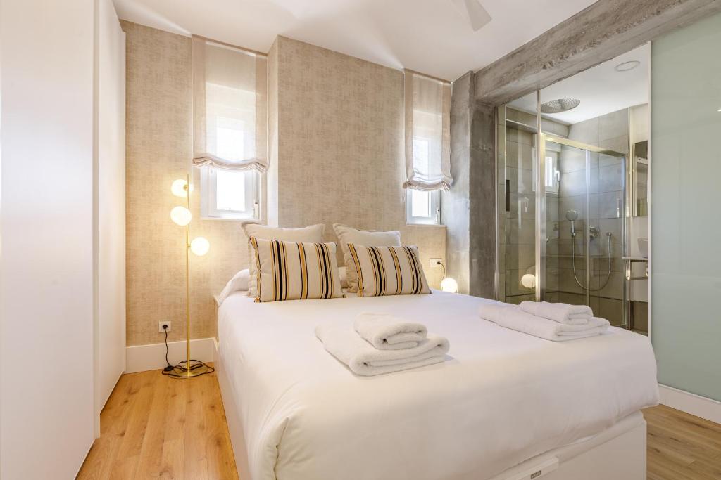 Posteľ alebo postele v izbe v ubytovaní Six Apartments by Caleta Homes