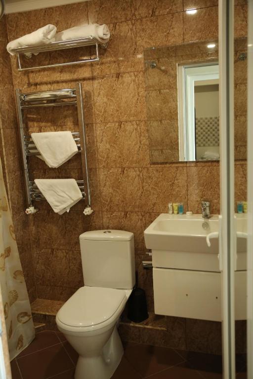 Koupelna v ubytování Vell Grey Hotel