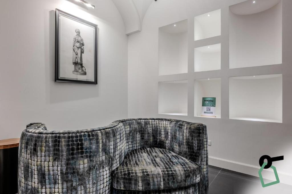 Posezení v ubytování HOTIDAY Room Collection - Napoli Diaz
