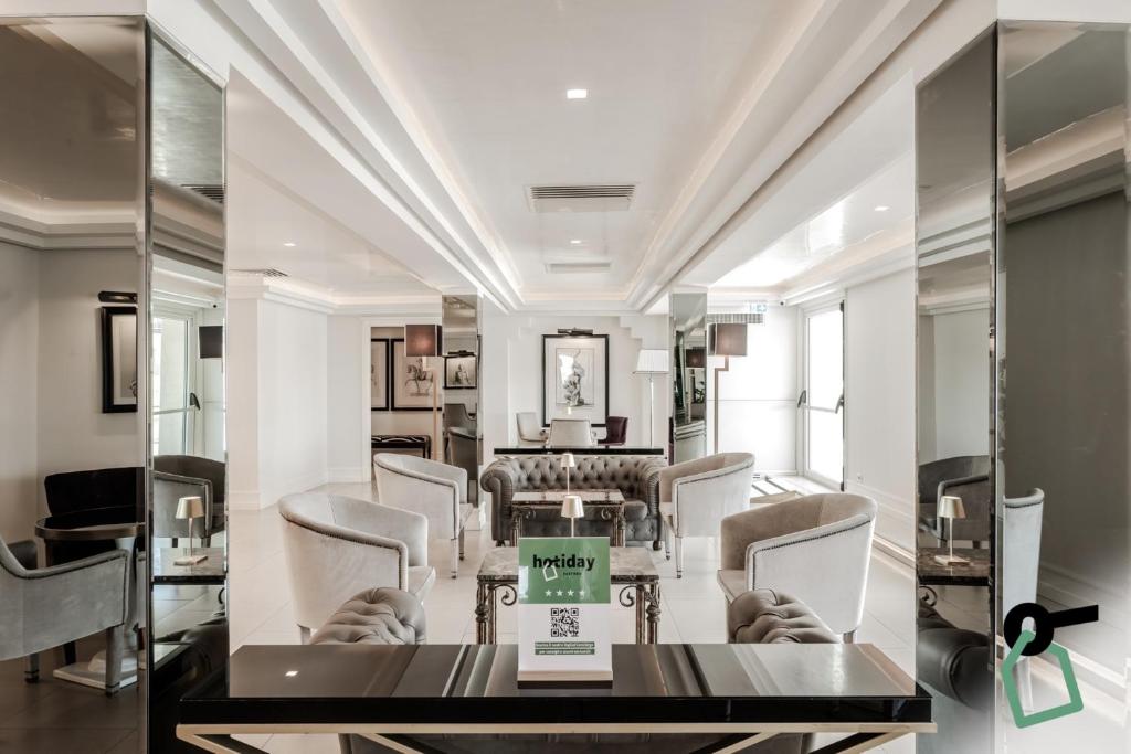 Posezení v ubytování HOTIDAY Room Collection - Napoli Diaz