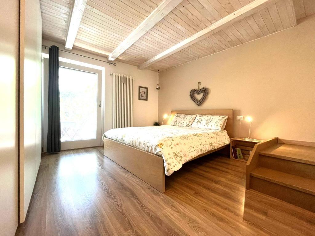 Ένα ή περισσότερα κρεβάτια σε δωμάτιο στο Maison Angela - You & Me case vacanza
