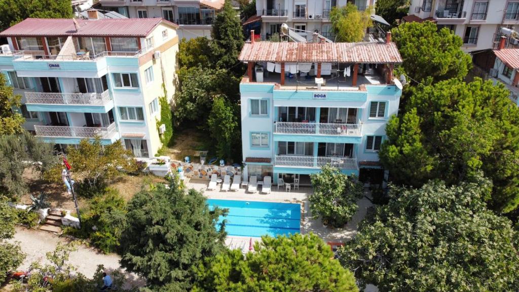 an aerial view of a building with a swimming pool at ASIA APART HOTEL in Kuşadası