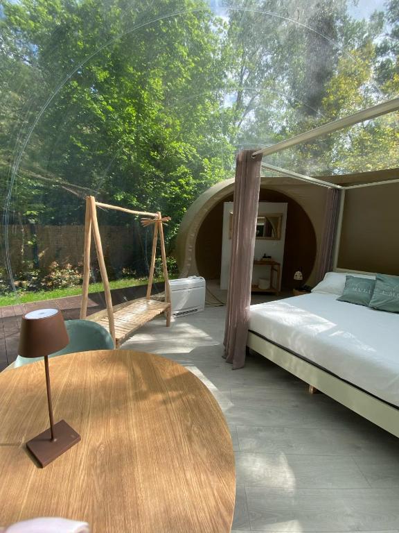 Postel nebo postele na pokoji v ubytování Glamping I Mulini