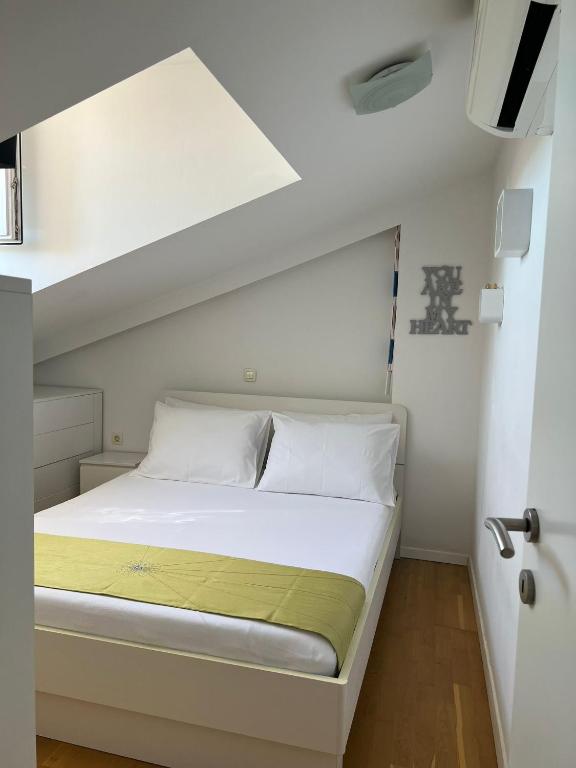 Postel nebo postele na pokoji v ubytování City Apartments Nada