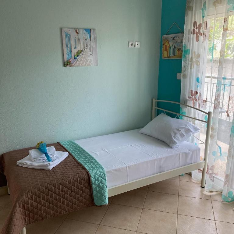 Postel nebo postele na pokoji v ubytování Kap's appartment (1)