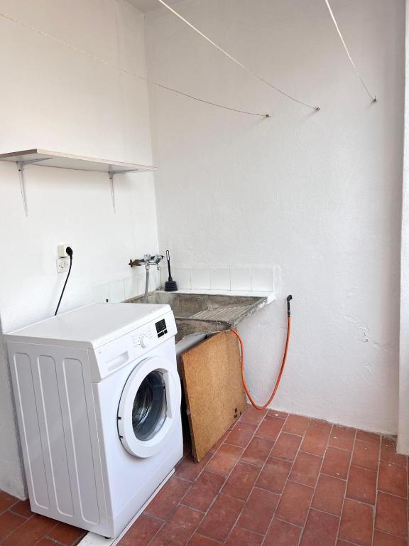 Kuchyň nebo kuchyňský kout v ubytování Ap NURIMAR 2 con Aire Acondicionado en Centro del Pueblo