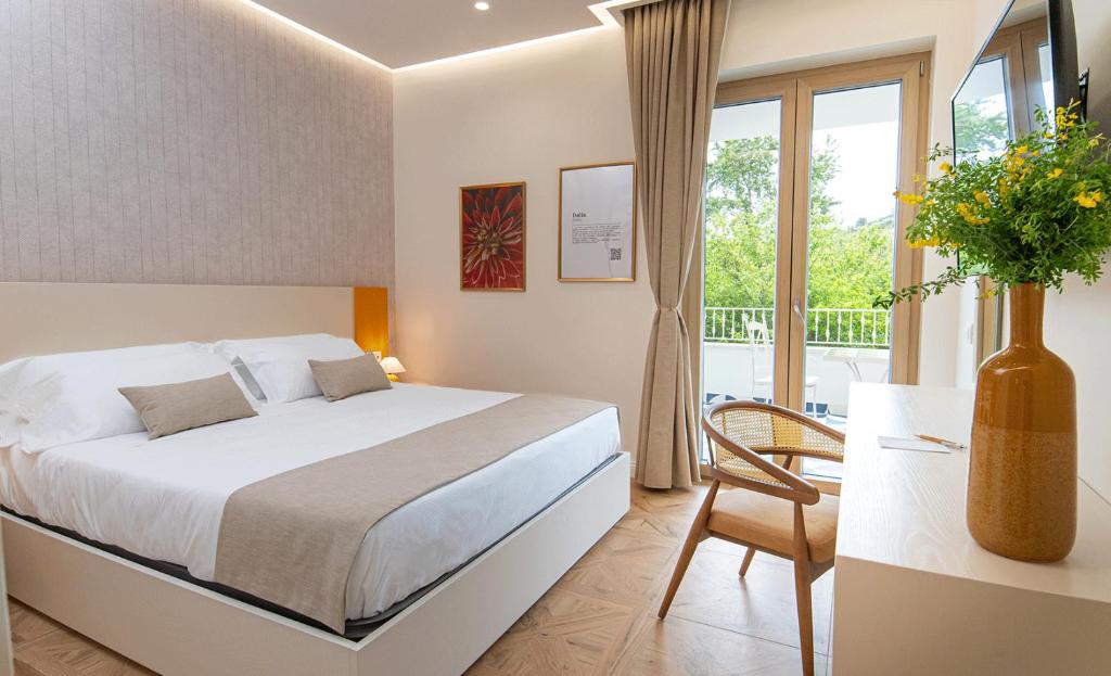 Postel nebo postele na pokoji v ubytování Don Salvatore Resort