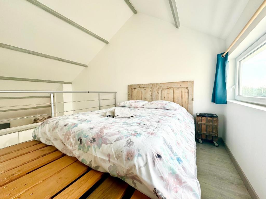 Кровать или кровати в номере L'Opaline - Vue mer