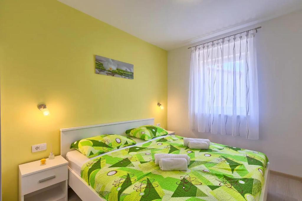 Postel nebo postele na pokoji v ubytování Apartment Viola ,2019