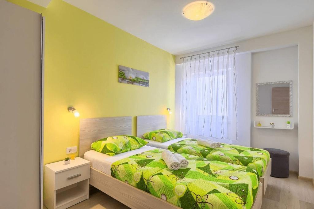 Postel nebo postele na pokoji v ubytování Apartment Viola ,2019