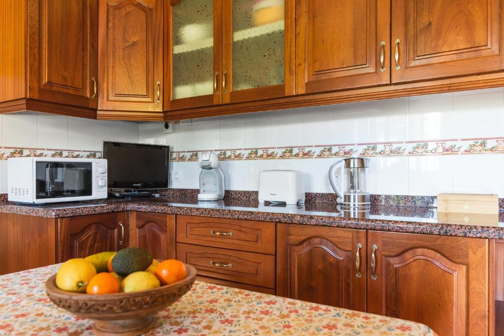 A kitchen or kitchenette at Villa Arrebol Azul