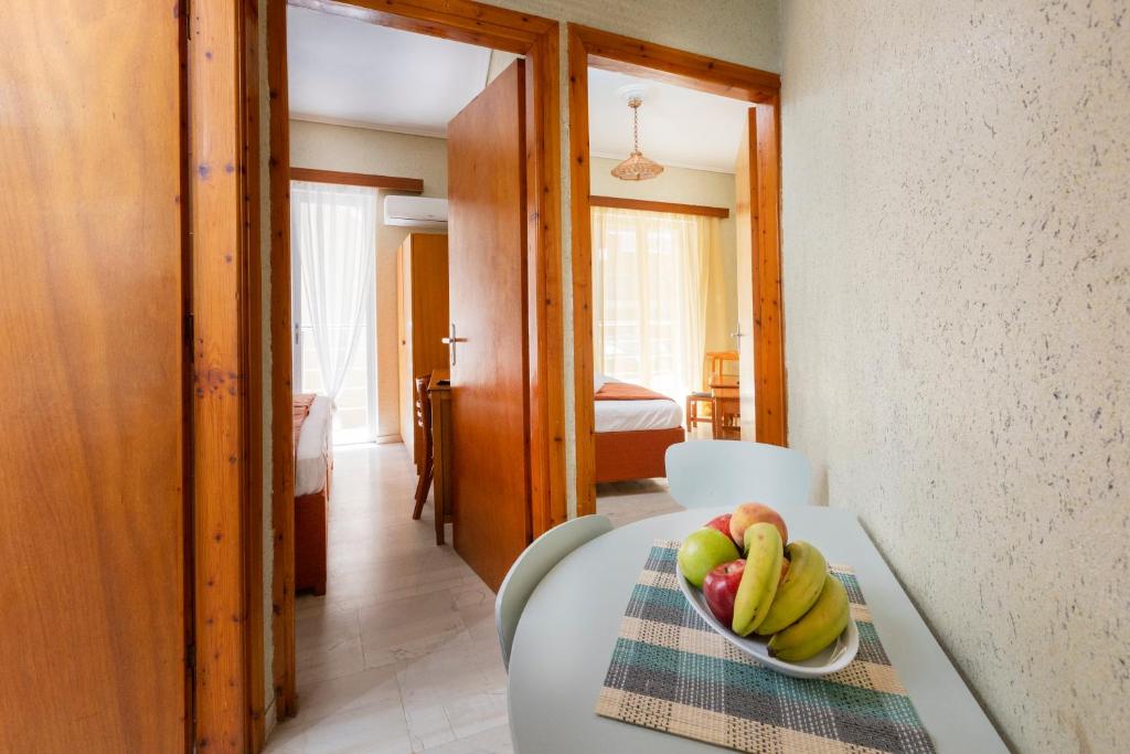 Postel nebo postele na pokoji v ubytování Oelia Rooms & Apartments
