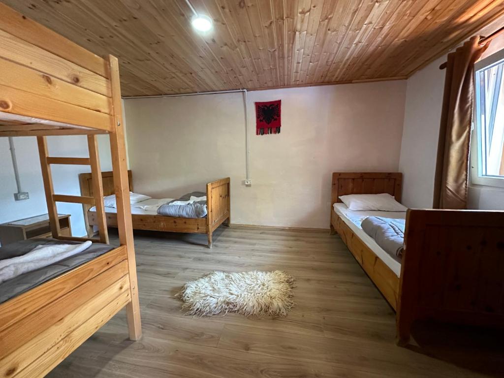Postel nebo postele na pokoji v ubytování Guesthouse Kroni I Micanit