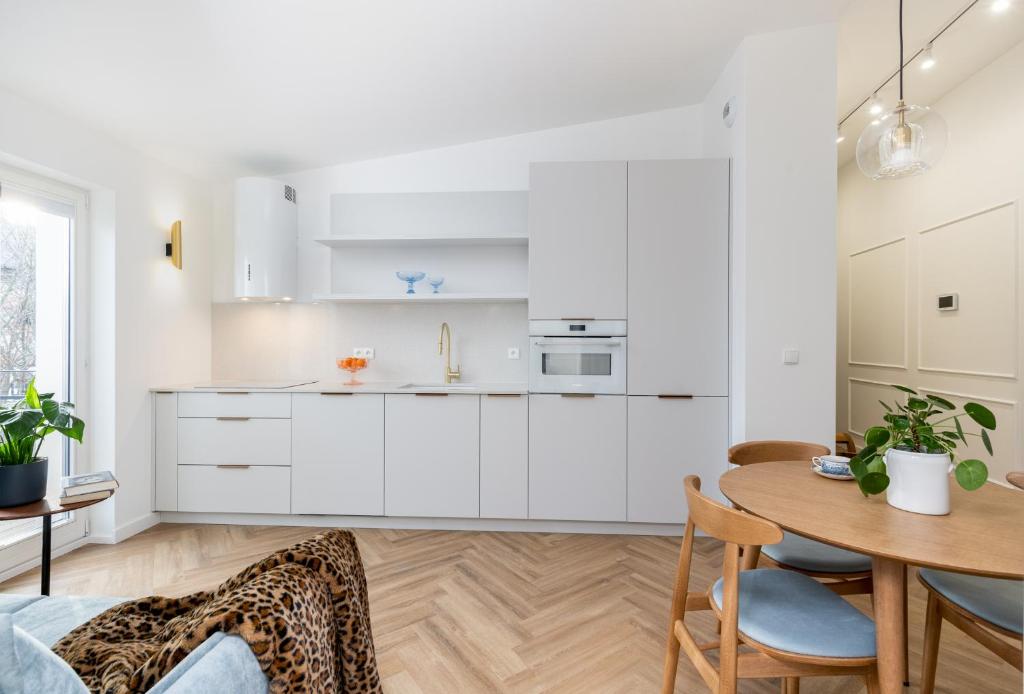 Kuchyňa alebo kuchynka v ubytovaní Tyzenhauz Apartments Kazimierz