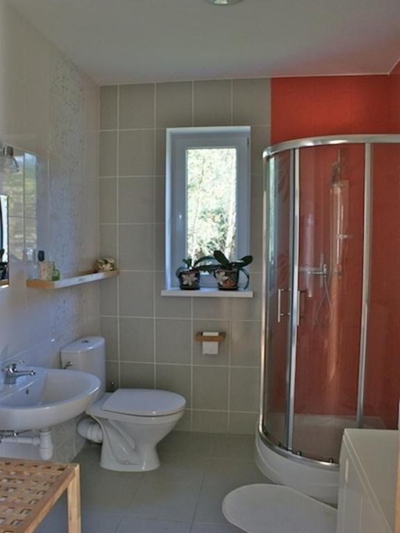 Kúpeľňa v ubytovaní Domek Jantar