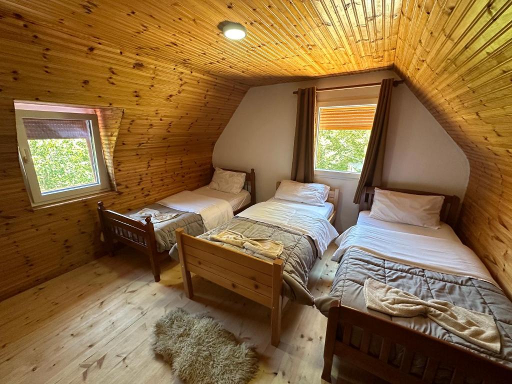 Postel nebo postele na pokoji v ubytování Guesthouse Kroni I Micanit