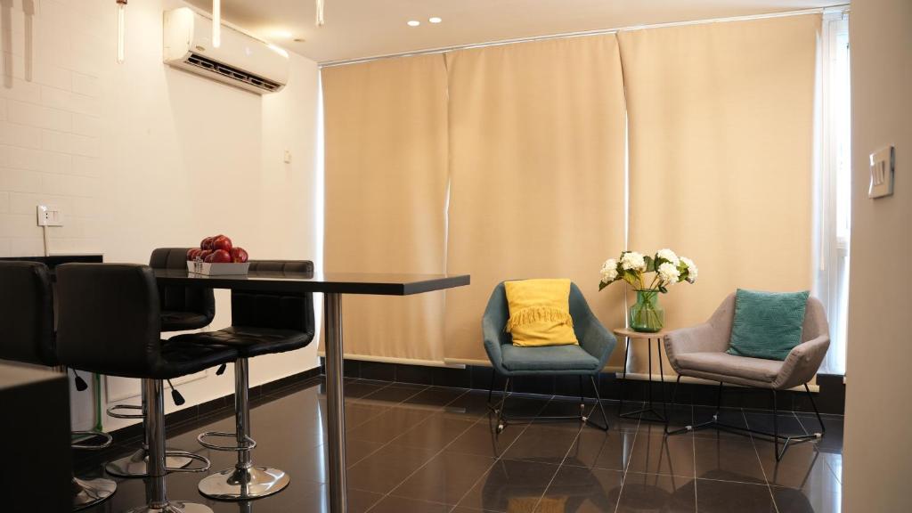 Posezení v ubytování B RESIDENCE