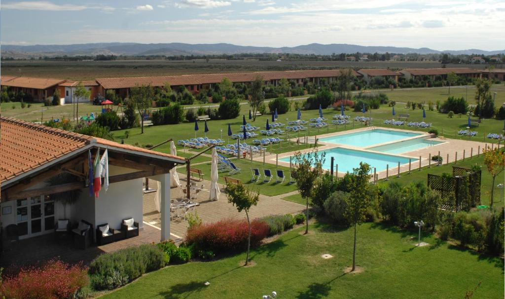 an aerial view of a resort with a swimming pool at Residenza Principina in Principina Terra