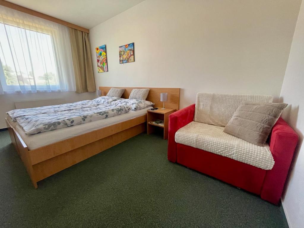 Postel nebo postele na pokoji v ubytování U Zámečku 108
