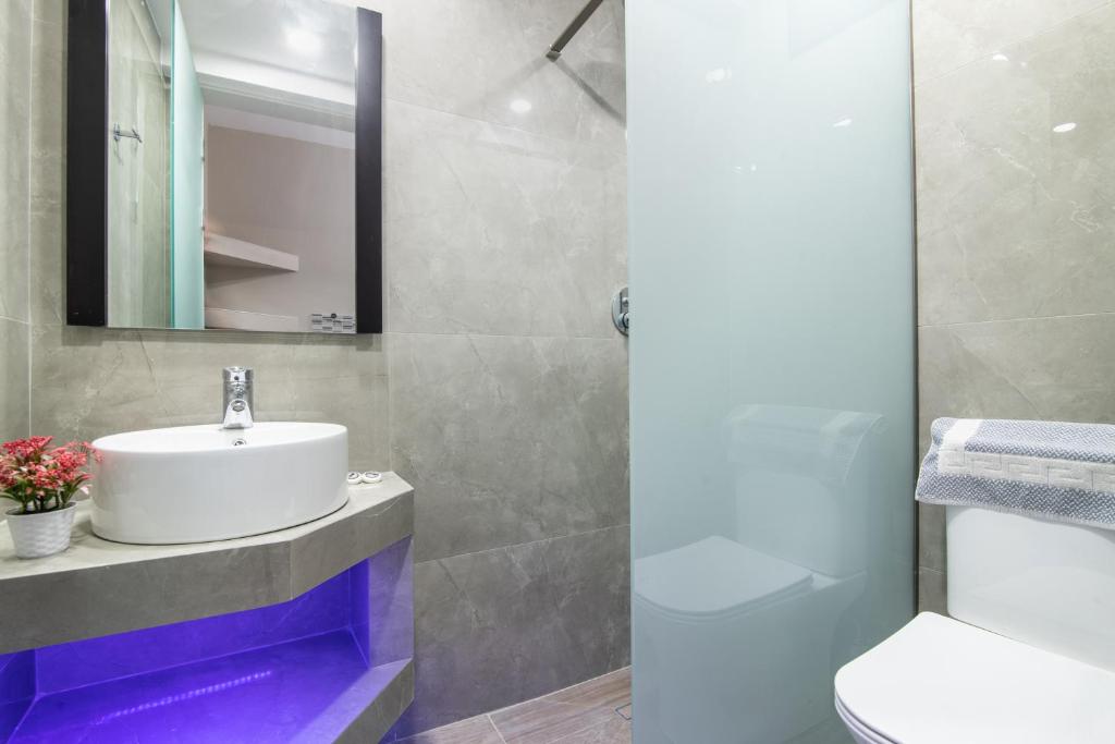 Koupelna v ubytování Savvas Hotel