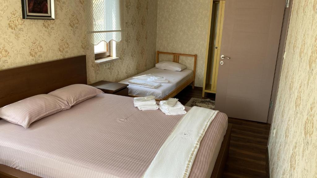 Postel nebo postele na pokoji v ubytování Nilüfer Butik Otel
