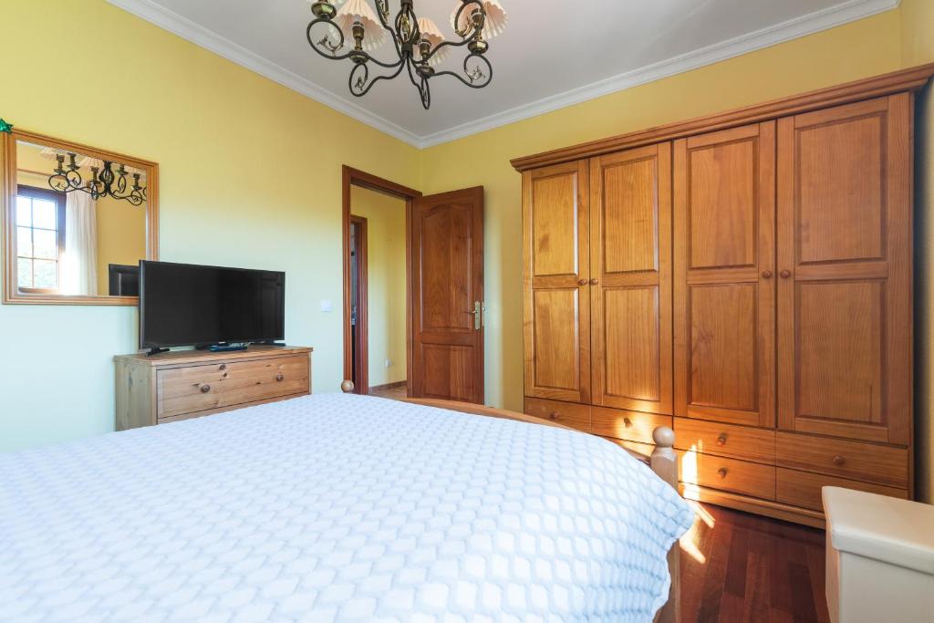 A bed or beds in a room at Villa Arrebol Azul